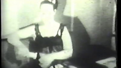 Sexy brunet in lingerie plays with a